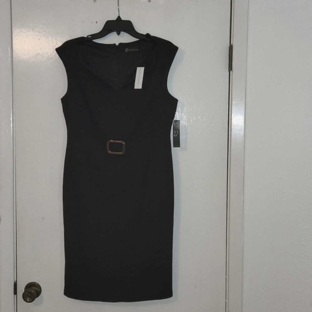 Nice fitted black dress with lining.